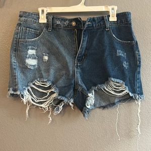 Ripped color block denim shorts